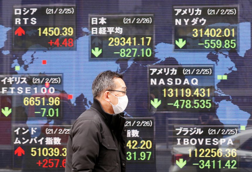 Asia markets fall after Fed holds rates, but signals higher rates for longer