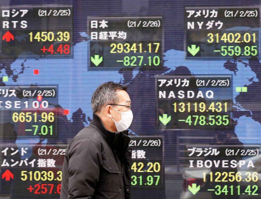 Asia markets fall after Fed holds rates, but signals higher rates for longer